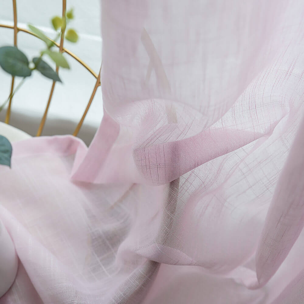 pink rod pocket semi-sheer curtains with subtle texture, ideal for cozy sliding glass doors