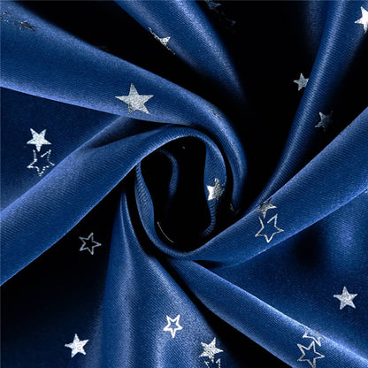 Close-up of silver star pattern on navy balloon curtains, ideal for nursery, children's bedroom or playroom decor.